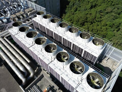 Aerial view of rooftop cooling towers for AI data center and cloud computing facility.