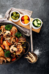 Family dinner. Roasted chicken with vegetables. Healthy eating.