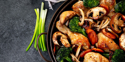 Family dinner. Roasted chicken with vegetables. Healthy eating.