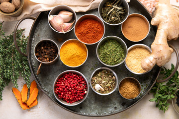 Different aromatic spices in bowls.