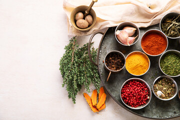 Different aromatic spices in bowls.