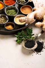 Different aromatic spices in bowls.