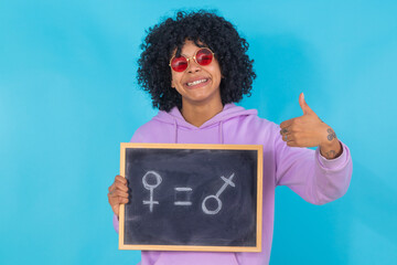 isolated girl with blackboard and equality concept