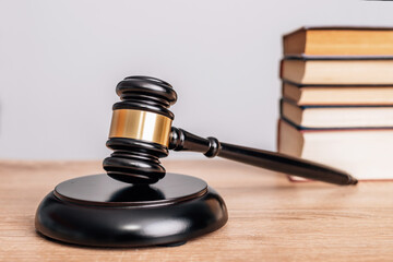 gavel of justice with stacked books