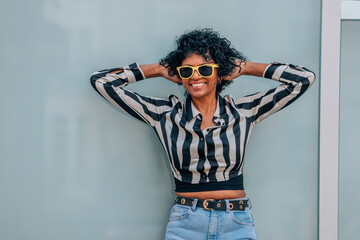 middle-aged woman on the street wearing sunglasses