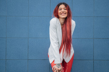 redhead girl smiling happy on the street