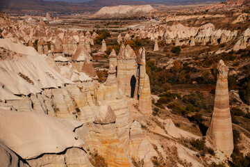 Aerial view of amazing stone pillars in the beautiful valley of love, Cappadocia
