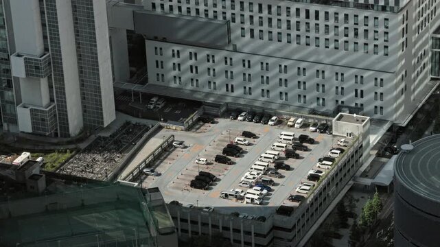 Tokyo Scene : Sunlight Enters the Rooftop Parking Lot of a Building in Central Business District  |  Shinjuku, Tokyo, Japan