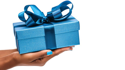 Hand holding a blue gift box with a shiny ribbon isolated on a white background