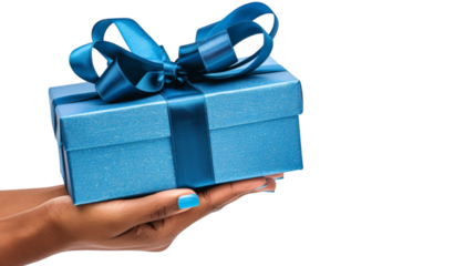 Hand holding a blue gift box with a shiny ribbon isolated on a white background