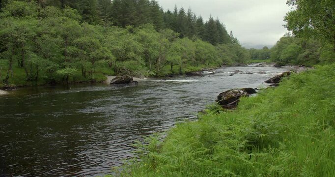 Extra wide shot looking up Stream of the river Orchy near Eas Urchaidh, The Falls of Orchy,