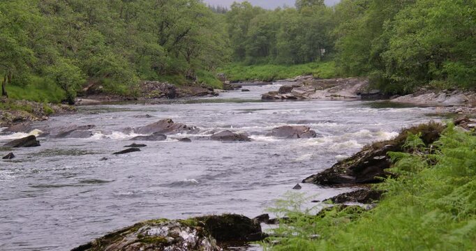 wide shot looking up Stream of the river Orchy near Eas Urchaidh, The Falls of Orchy,