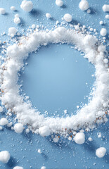 Light blue background with white snow and ice circular frame, textured icy surface and snowballs for winter or cold weather themes