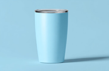 Light blue stainless steel insulated tumbler with a sleek matte finish and metallic lid, designed for beverages, standing on a pastel blue background