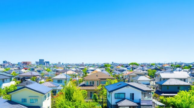 青空が広がる住宅街
