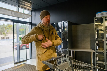Father and son spending time together during a winter grocery trip, walking with a shopping cart, sharing snacks, and enjoying everyday family moments outdoors near a store.