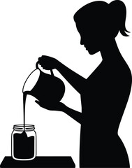 Woman pouring liquid into jar