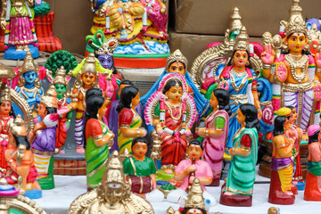 Fototapeta premium Baby shower scene dolls displayed for sale in a shop for the golu festival