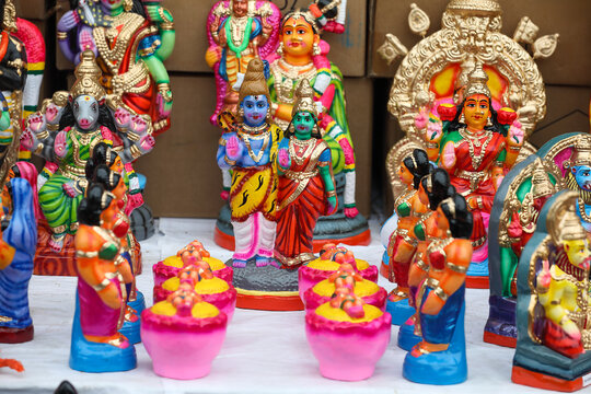 Lord murugan birth scene idols are displayed for sale in a shop for the golu festival