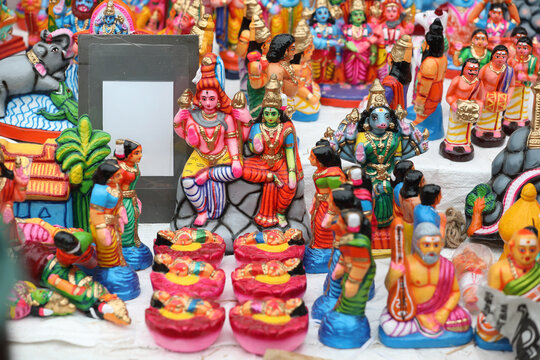 Lord murugan birth scene idols are displayed for sale in a shop for the golu festival