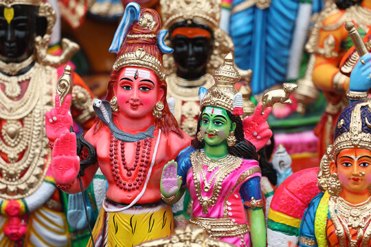 Shiva and Parvathi idols displayed for sale in a shop for the golu festival