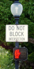 DO NOT BLOCK INTERSECTION sign on a lamp post
