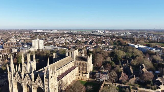 Peterborough Cathedral Cambridgeshire UK pull back drone aerial reverse reveal
