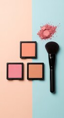 Makeup brush and blush compacts on dual tone background with soft peach and light blue hues