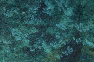 Abstract art emerald and dark teal watercolor texture background with camouflage pattern. Macro...