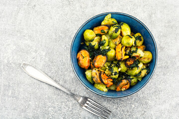 Delicious seafood, brussels sprouts dish and mussels.