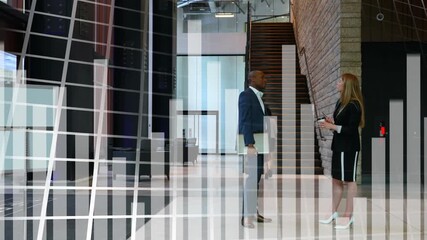 Animation of office building over business people talking in modern office - Powered by Adobe