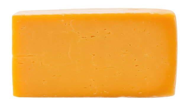 Isolated cheddar cheese block ready to be sliced, eaten or added to a cooking dish.