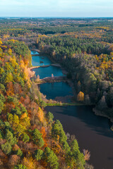 Obraz premium Nature park with embankment and walking paths in autumn