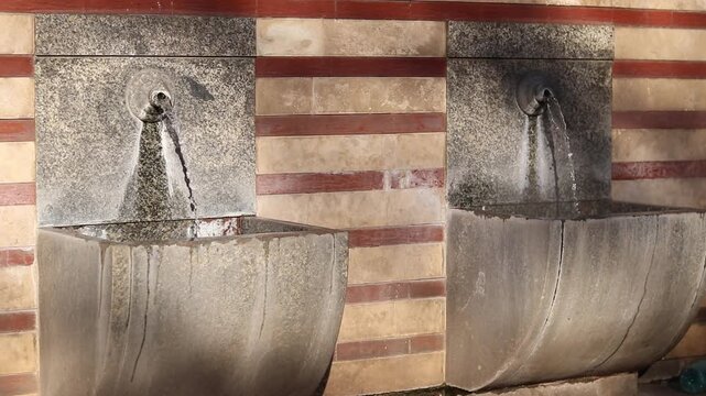 Public mineral hot water fountains. Ancient hot springs in the center of Sofia, Bulgaria. Hot mineral water source available to everyone. One of many springs in Sofia, Serdika district. Healing water