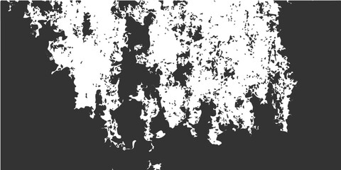 Abstract black and white grunge background vector design featuring ink splash splatters and a dirty paint spray texture with a decorative floral silhouette frame on stained paper art