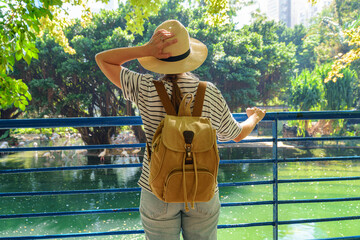 Female tourist is enjoying scenic view in Hong Kong