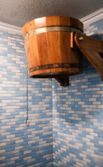 Wooden bucket for sauna and bath, perfect for water rituals and relaxation.