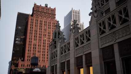 Stunning cityscape showcases a blend of historic and modern architecture against a bright sky...