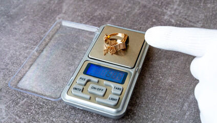 Weigh the jewelry.Find out the price of gold.Pawn the family valuables.