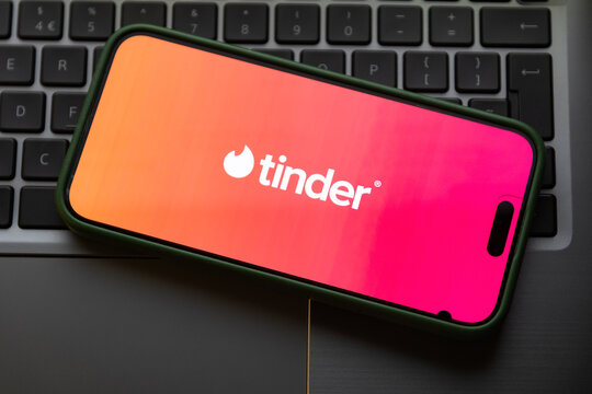 iPhone display with Tinder dating app