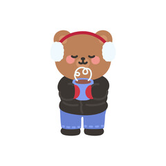A cute bear enjoying a warm drink