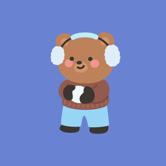 A cute bear making a snowball