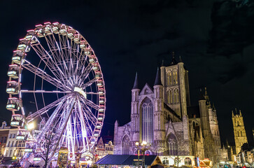 Saint Nicholas&rsquo; Church in Ghent with Christmas Ferris Wheel in Winter