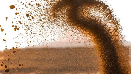 Golden particles exploding in dynamic motion against white background