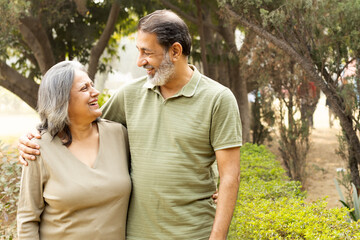 Obraz premium Indian Senior happy couple enjoying and spending time at park