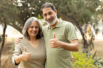 Fototapeta premium Indian Senior happy couple enjoying and spending time at park