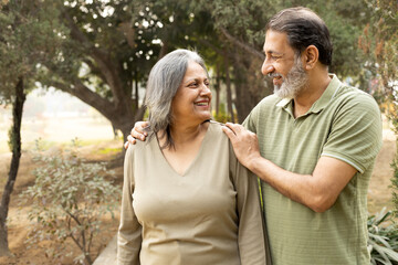 Obraz premium Indian Senior happy couple enjoying and spending time at park
