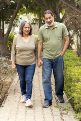 Obraz premium Indian Senior happy couple enjoying and spending time at park