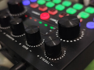 The soundcard is active with multicolored lights, photographed from close range.