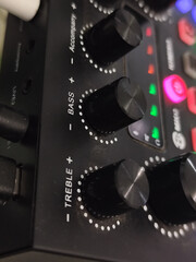 The soundcard is active with multicolored lights, photographed from close range.